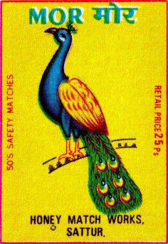 A matchbox label on a yellow ground: a blue and green peacock with its tail trailing behind it, the name MOR in green above the Devanagari मोर, the words fifty's safety matches and retail price 25 Ps running vertically up either side, and HONEY MATCH WORKS, SATTUR along the bottom.